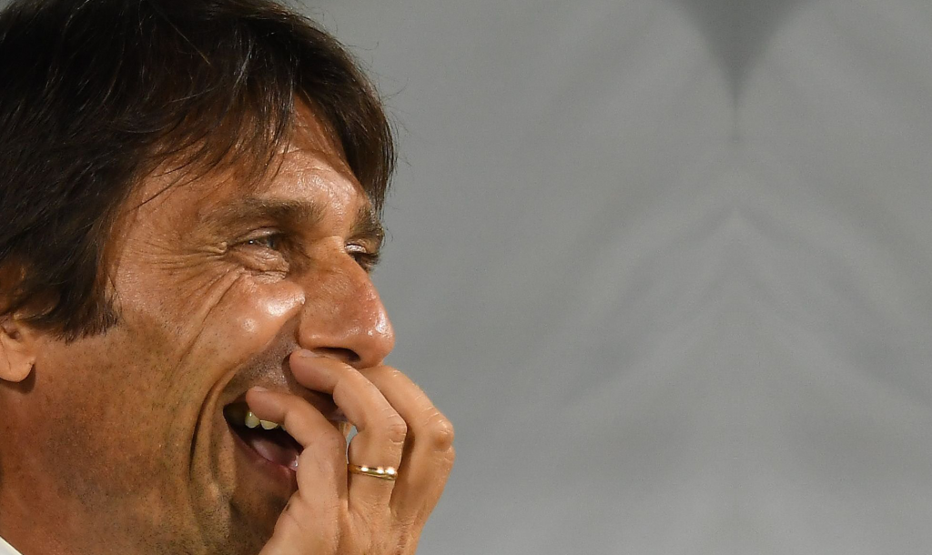 Conte sorride